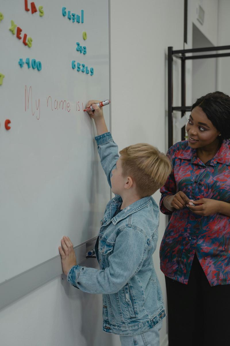 Black students collaborating in a classroom activity